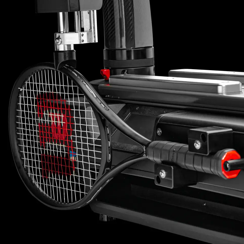 Image of Wilson racket on Baiardo Stringing Machine, black background