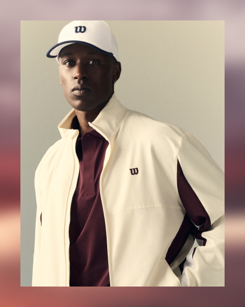 man in a white jacket with a burgundy shirt