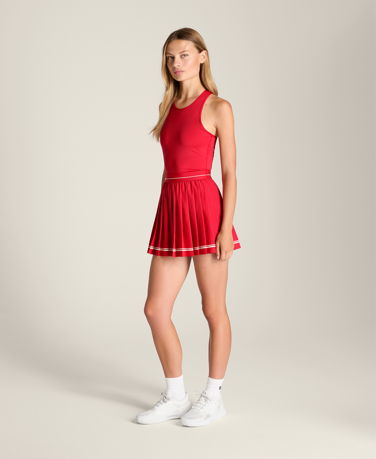 WE00080R044001_1_W_LASER_CUT_PLEAT_DRESS_W_VARSITY_RED.png