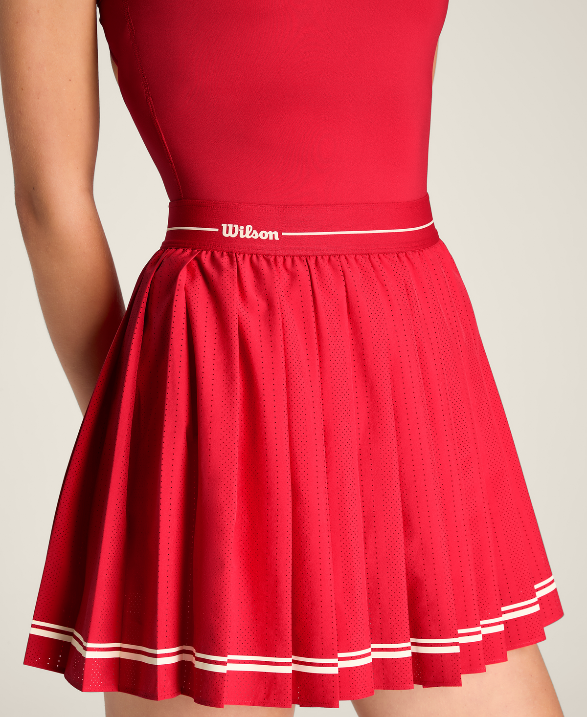 WE00080R044001_4_W_LASER_CUT_PLEAT_DRESS_W_VARSITY_RED.png