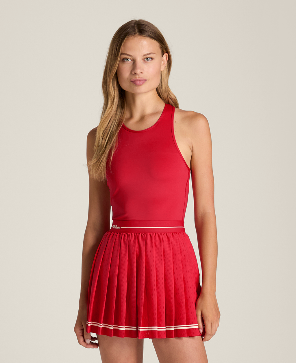 WE00080R044001_7_W_LASER_CUT_PLEAT_DRESS_W_VARSITY_RED.png