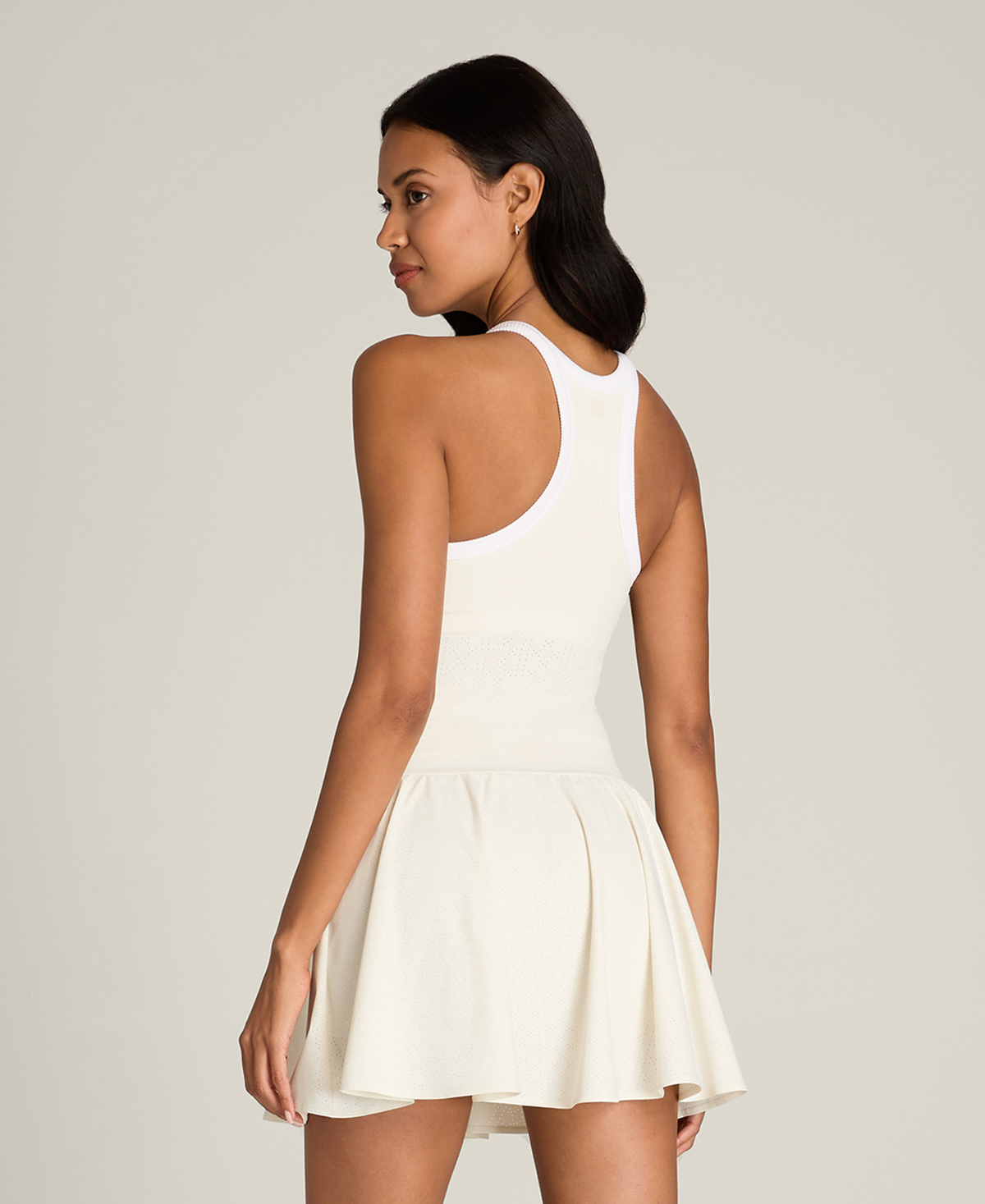 WE00194W002001_9_W_ON_THE_DAILY_DRESS_PERFORATED_W_SANDRIFT.png