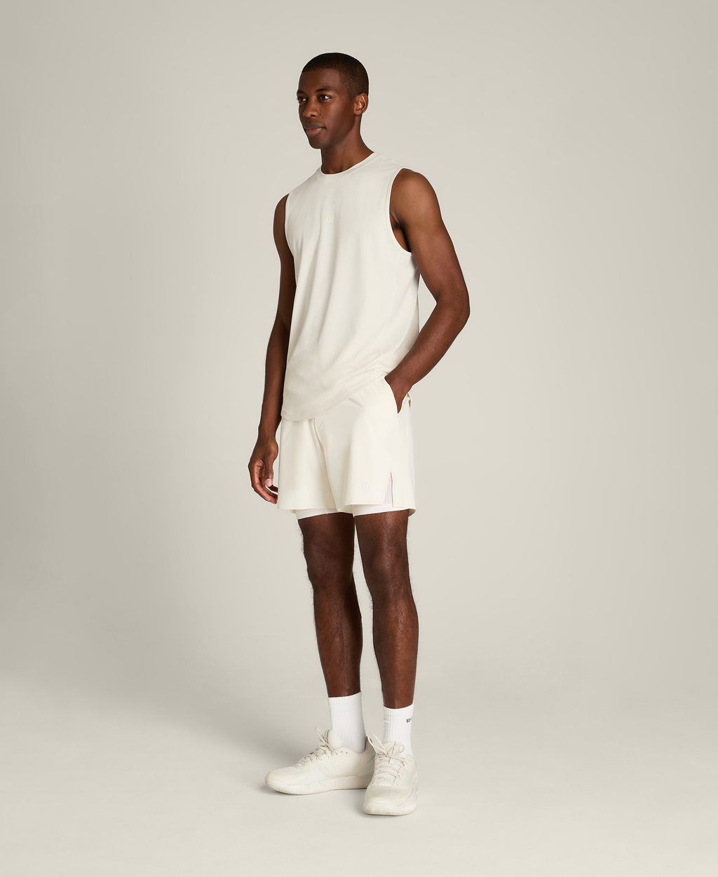 WM00443W002001_1_M_PEAK_UNLINED_TENNIS_SHORT_7IN_M_SANDRIFT