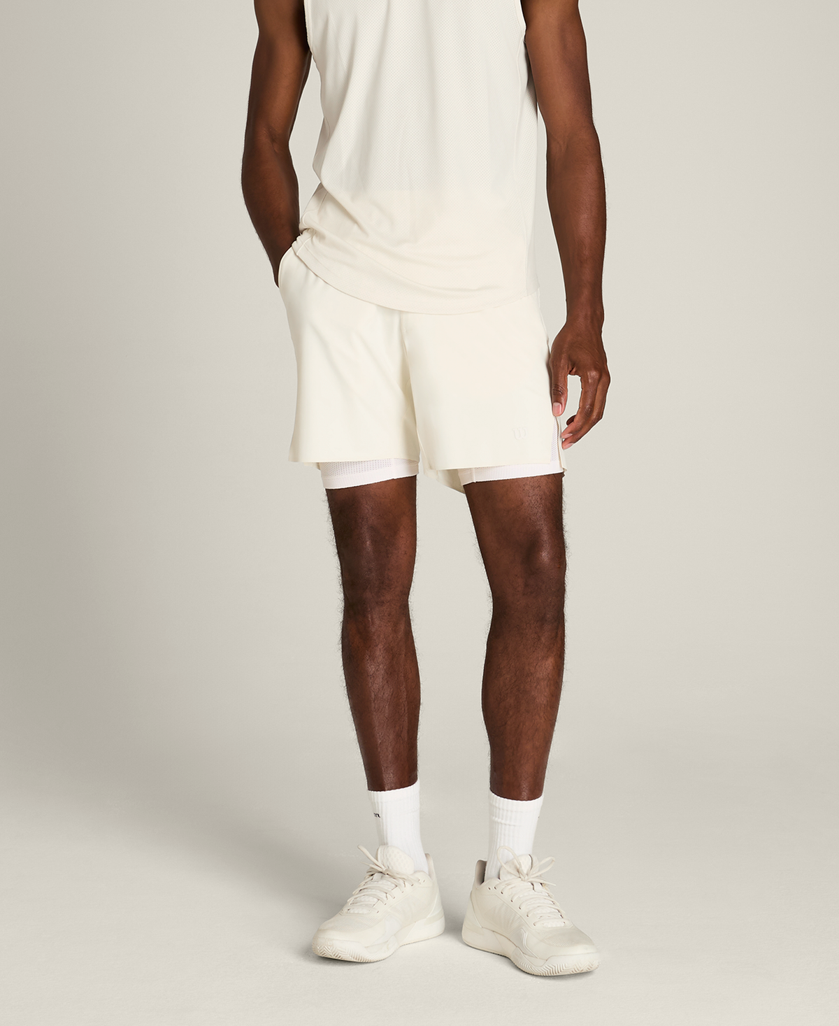 WM00443W002001_7_M_PEAK_UNLINED_TENNIS_SHORT_7IN_M_SANDRIFT