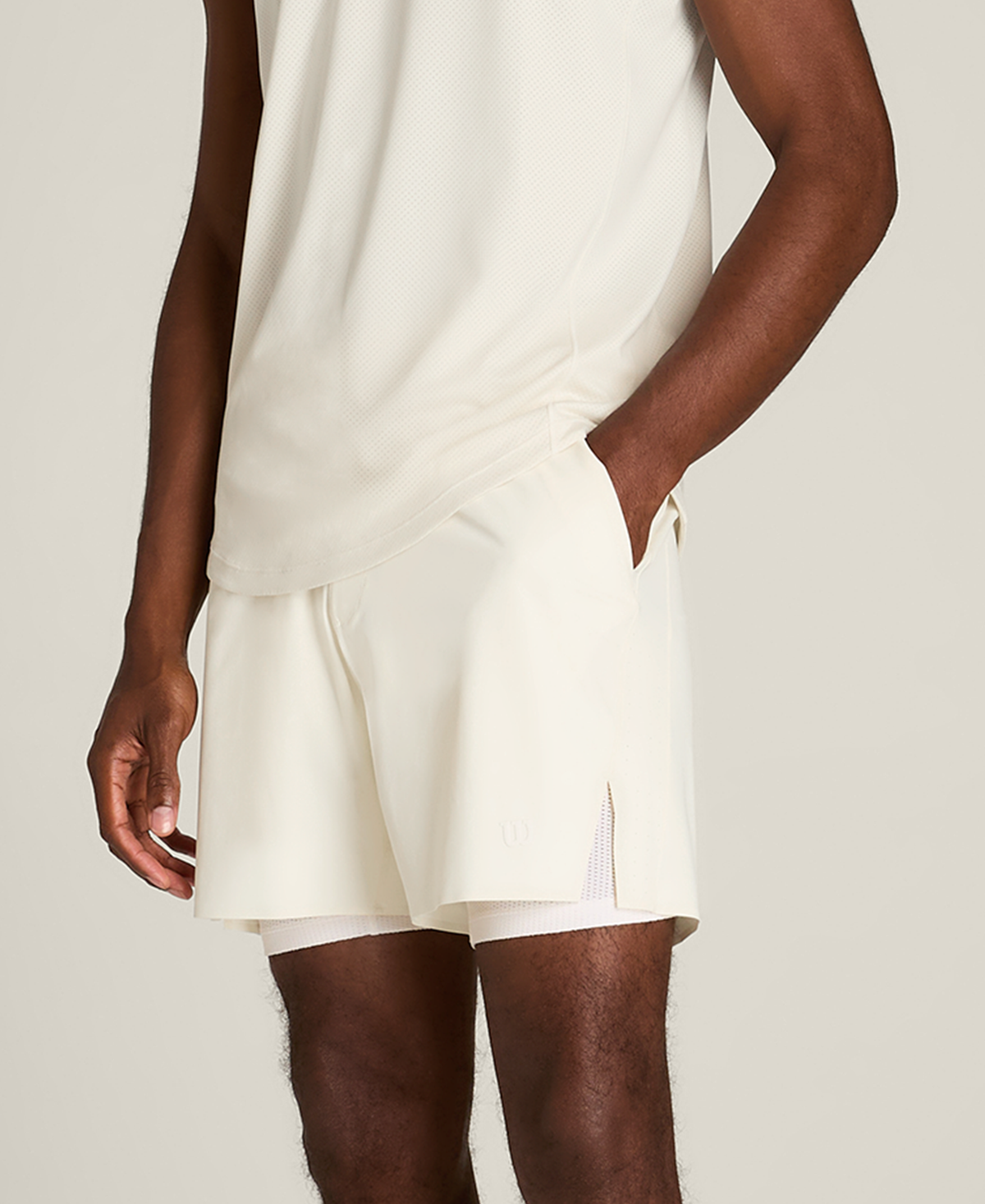 WM00443W002001_8_M_PEAK_UNLINED_TENNIS_SHORT_7IN_M_SANDRIFT