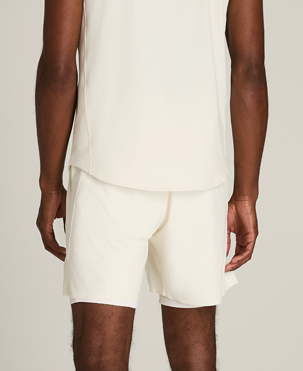WM00443W002001_9_M_PEAK_UNLINED_TENNIS_SHORT_7IN_M_SANDRIFT