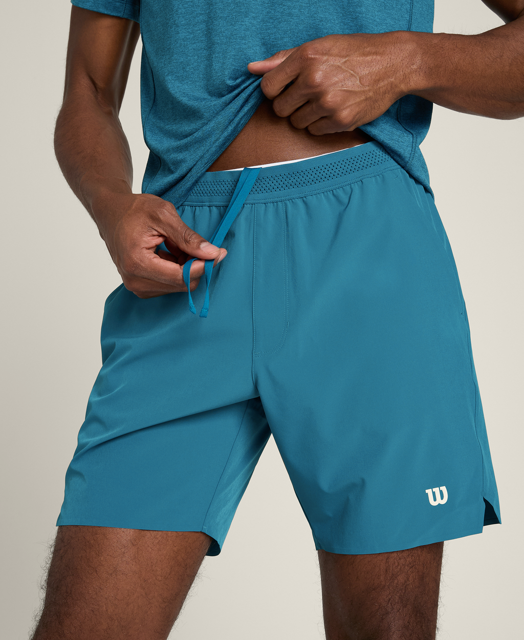 WM00502U050002_3_TOURNAMENT_SHORT_7IN_UNLINED_M_LYONS_BLUE.png