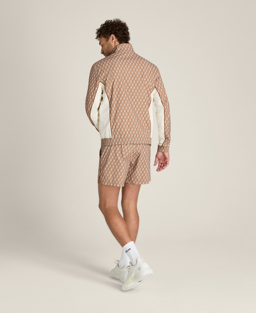 WM00544Z018001_2_GRAND_SLAM_JACKET_M_SUNTAN