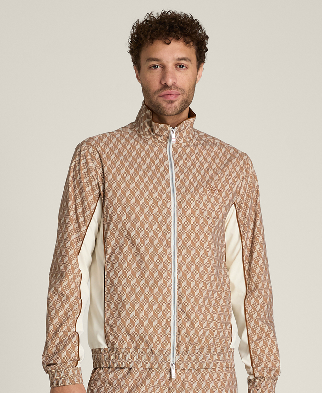 WM00544Z018001_7_GRAND_SLAM_JACKET_M_SUNTAN