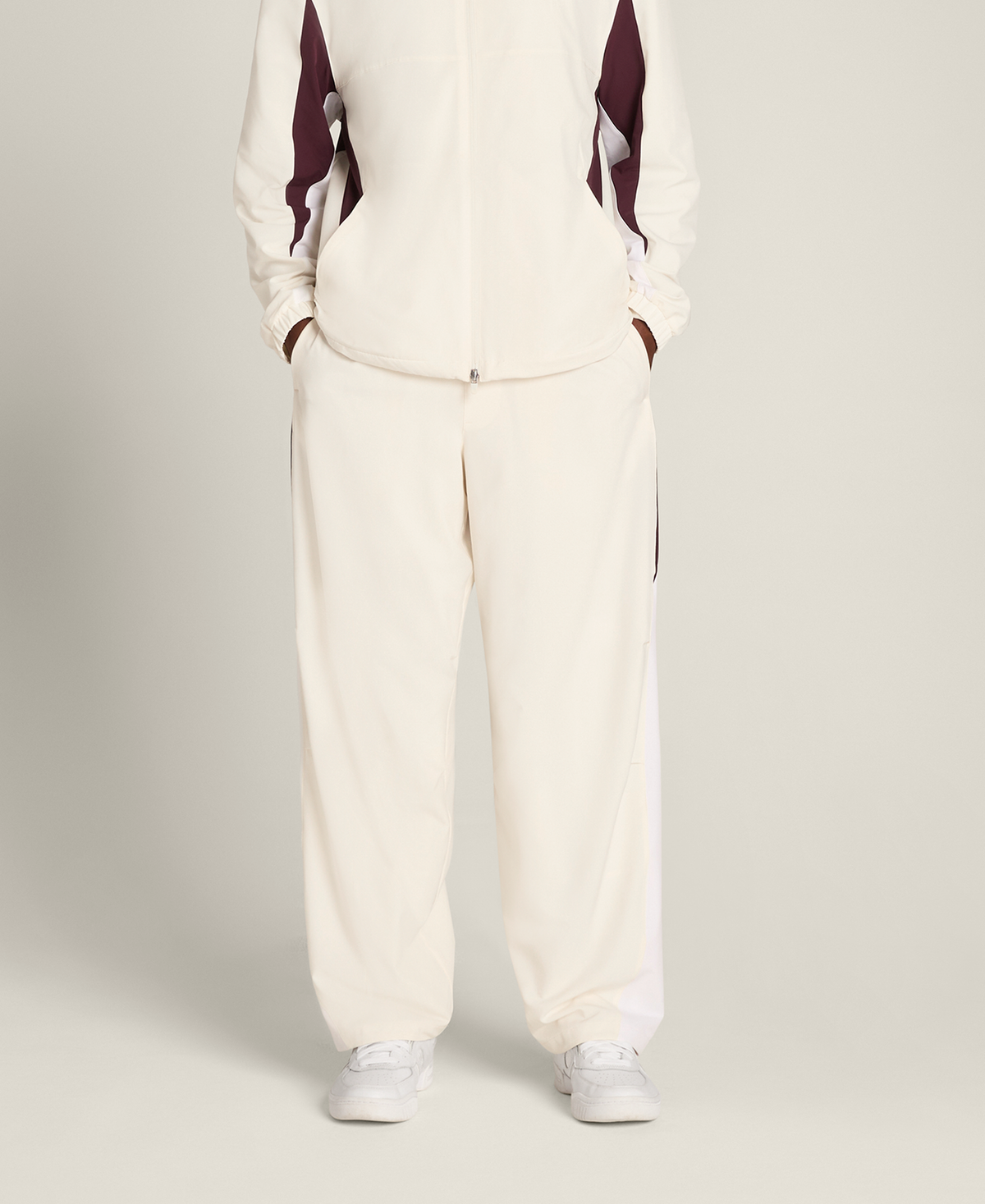 WN00119W002001_7_M_RUSH_RALLY_WARM_UP_PANT_M_SANDRIFT.png