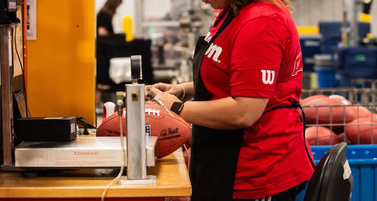 Molding and inspecting a NFL football