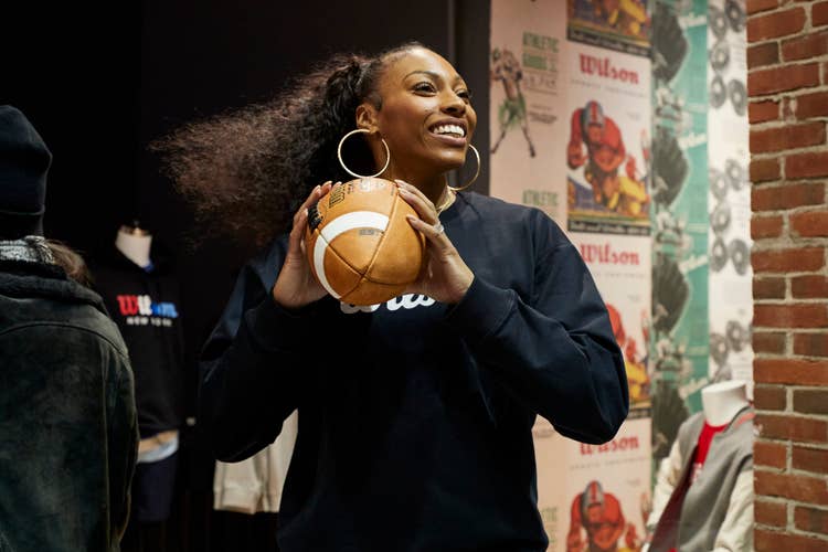 woman with leather football
