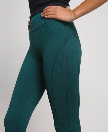evolution tights in deep teal