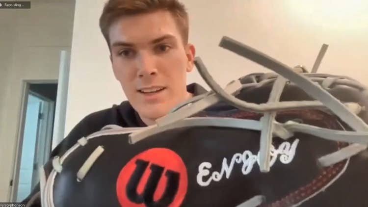 a close-up of stephenson's glove personalization that reads "enjoy"