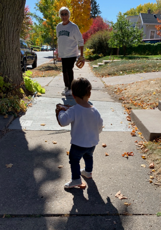 Dick and his grandson with their gloves