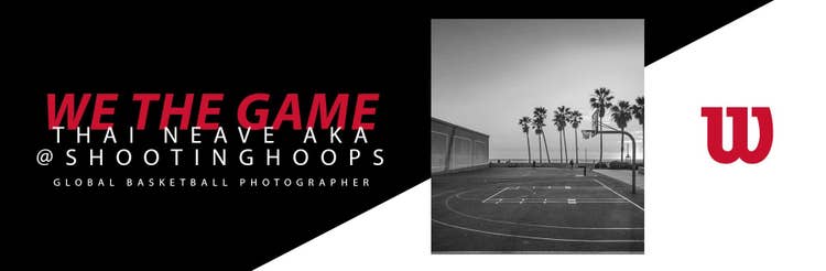 Photographer Thai Neave with a camera on a basketball court