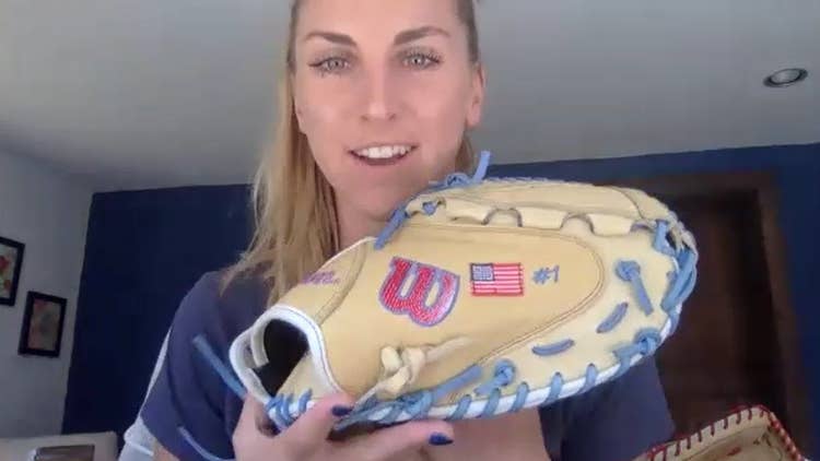 Aubree holding her catcher's mitt