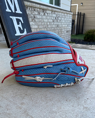 Photo of Kelsey Stewart's glove showing the white ring finger