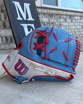 Photo of Kelsey Stewart's glove showing "Stewie" embroidered on the side