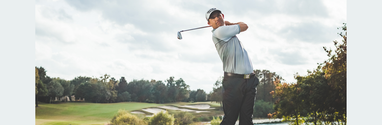 Padraig Harrington hitting a golf ball