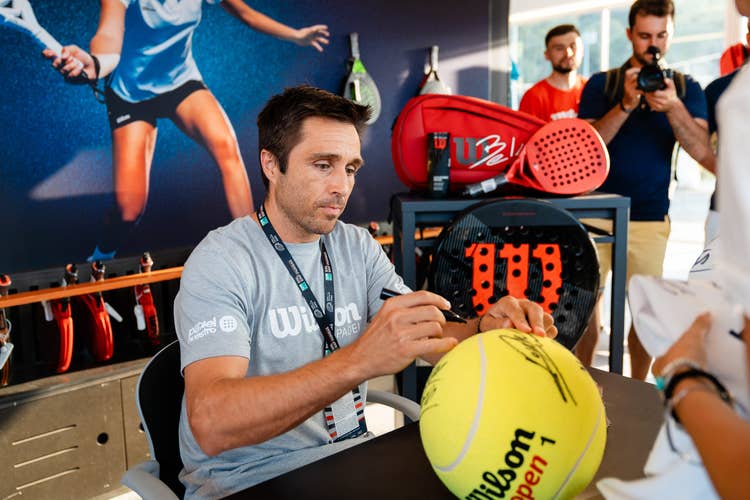 Fernando Belasteguin signing a Wilson Jumbo ball