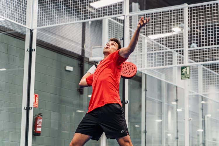 Bela playing padel in Wilson clothes