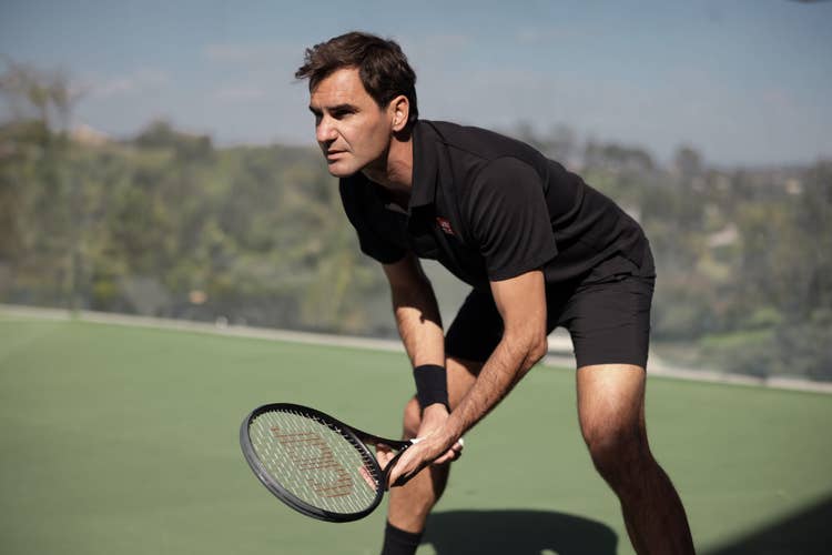 Roger Federer with the RF 01 Pro Tennis Racket