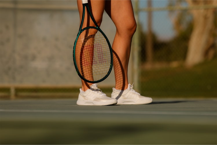 Wilson Intrigue tennis shoes on model