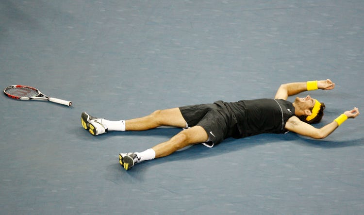 Del Potro lying on Arthur Ashe Court