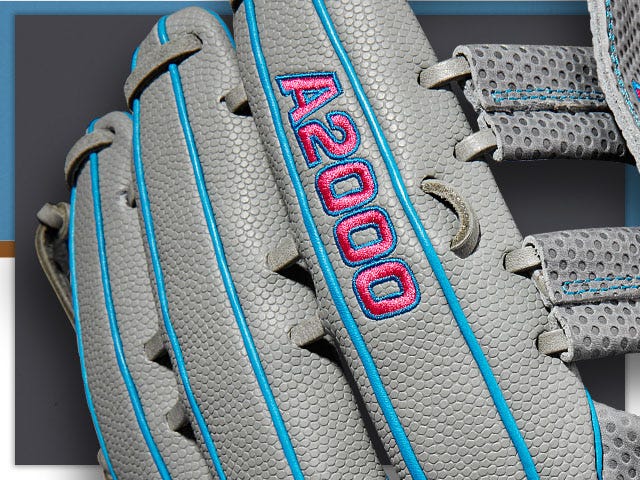 close up of gray baseball glove with blue and red A2000 logo stitched in